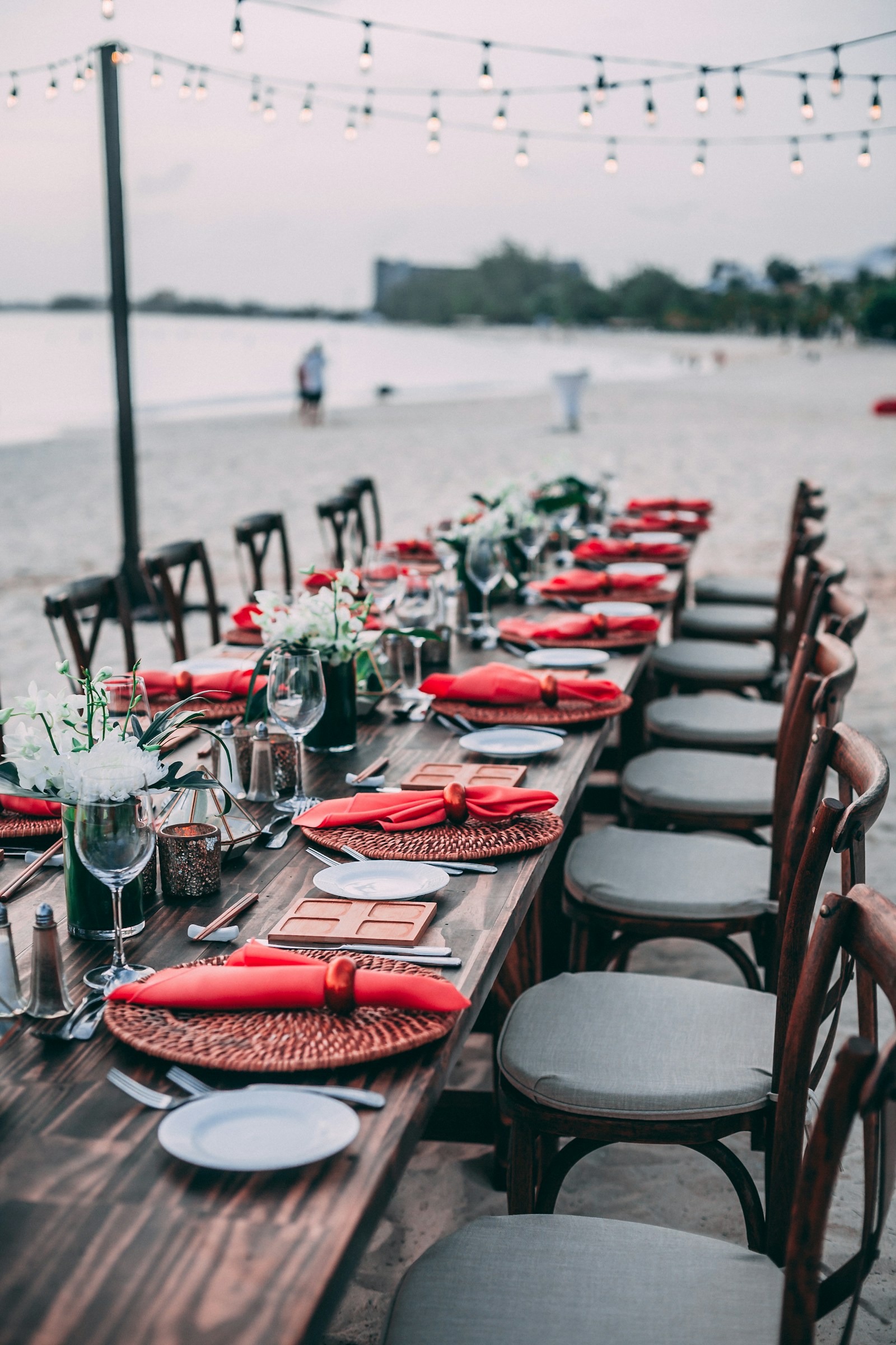 A long table set for an outdoor celebration — what all the planning decisions are working toward
